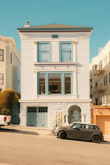 This image presents a centered architectural portrait of a classic San Francisco